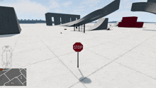 a stop sign in a video game with a bus behind it