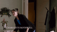 charlotte rothwell is the name of the woman standing in front of a table