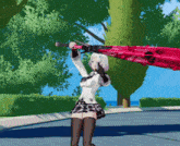 a girl in a plaid skirt holds a red umbrella over her head