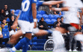 a soccer player with the number 10 on his jersey is running on the field