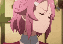 a girl with pink hair has a white bandage on her face