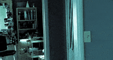 a blue room with a light switch that says ' n ' on it