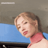 a close up of a woman 's face with the words ormkorngifs on the bottom right