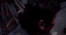 a close up of a man with blood on his face and mouth