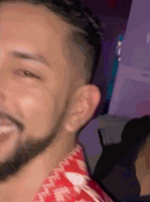 a close up of a man 's face with his eyes closed