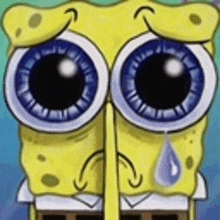 spongebob squarepants is crying and has a tear coming out of his eye .