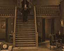 Buster Keaton Slide GIF - Buster Keaton Slide Stairs Fall GIFs