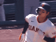 a baseball player for the san francisco giants is running