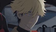 a close up of a boy with yellow hair and orange eyes
