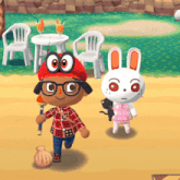 a boy and a bunny are walking in a video game