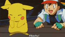 ash and pikachu are standing next to each other
