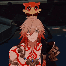 a man with a hamster on his head has a necklace with the letter n on it