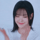 a close up of a woman making a funny face with her hands on her face