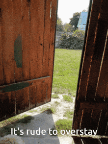 an open wooden door with the words it 's rude to overstay written on it