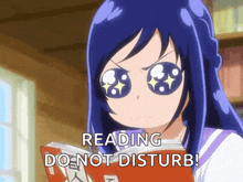a girl reading a book with the words reading do not disturb behind her