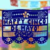 a blue banner that says happy cinco de mayo hangs from a rope