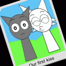 a picture of two cartoon cats with the words our first kiss below them