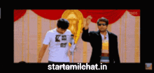 two men are standing next to each other with the website starttamilchat.in written on the bottom