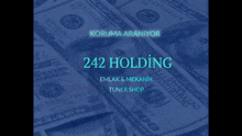 a bunch of money with the words 242 holding on top