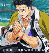 a man is praying with a rosary in his hands and says good luck with today .