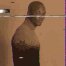 a blurry photo of a man with a turtleneck sweater