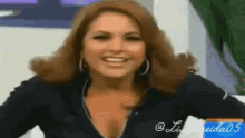 a woman with a plunging neckline and hoop earrings is smiling ..