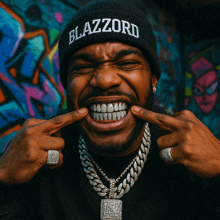 a man wearing a black beanie that says blazzord on it