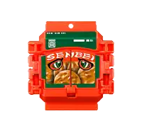 a toy that looks like a hamburger with a green face