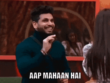 a man is standing in front of a mirror and says aap mahaan hai .