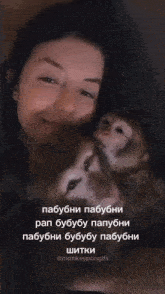 a woman is holding two monkeys with a caption that says " monkeypongifs "