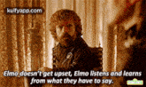 a man with a beard is sitting in a chair and saying elmo does n't get upset .