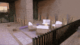 an artist 's impression of a patio area with a fire pit