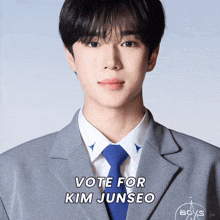 a man in a suit and tie with the words vote for kim junseo