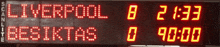a scoreboard displays the score of the liverpool vs beşiktaş match