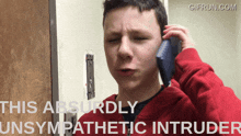 a boy talking on a cell phone with the words this absurdly unsympathetic intruder