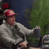 a man wearing headphones and a hat that says chicago