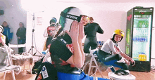 a person wearing a helmet with uvex written on it