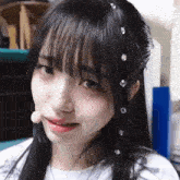 a girl with a tear coming out of her eye
