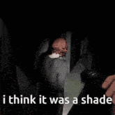 a woman covering her ears in a dark room with the words " i think it was a shade "