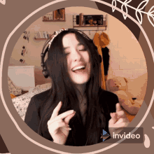 a woman wearing headphones is surrounded by a circle that says invideo on it