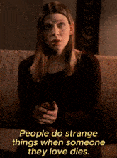 a woman is sitting on a couch with a quote that says people do strange things when someone they love dies