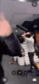 a person is taking a picture of a staircase while wearing an oculus headset