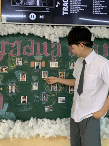 a man stands in front of a blackboard that has the word radian on it