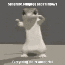 a lizard is standing on its hind legs with the words sunshine lollipops and rainbows everything that 's wonderful