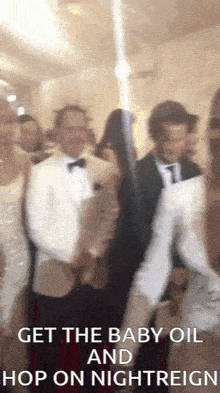 a group of people are standing in a room with the words get the baby oil and hop on nightreign on the bottom