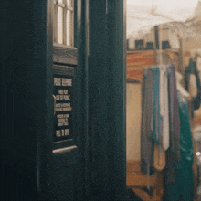 a door with a sign that says police telephone free for use of public