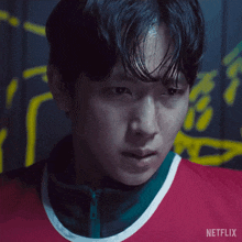 a close up of a man 's face with netflix written on the bottom right