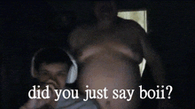 a man with headphones is standing next to a man with a huge belly and the words did you just say boii
