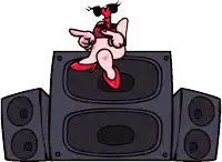 a cartoon character sitting on top of a speaker