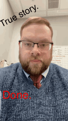 a man with glasses and a beard is wearing a blue sweater with the words true story done below him